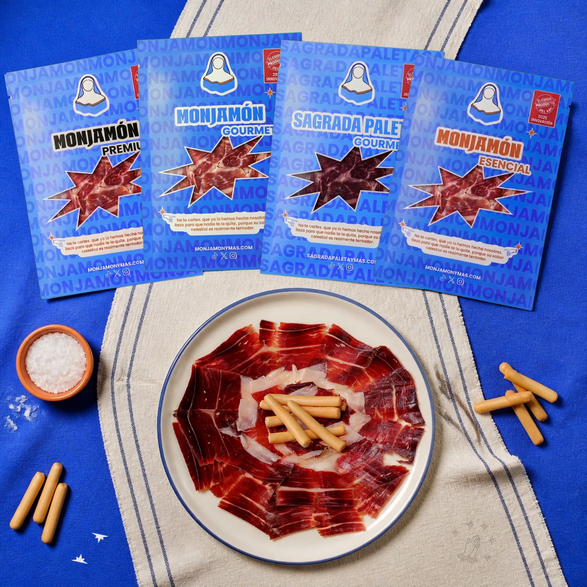 Cata Vertical 4 Calidades de Jamón Loncheado – vista desde arriba: una cata de cuatro jamones distintos en una bandeja, con los cuatro sobres al lado